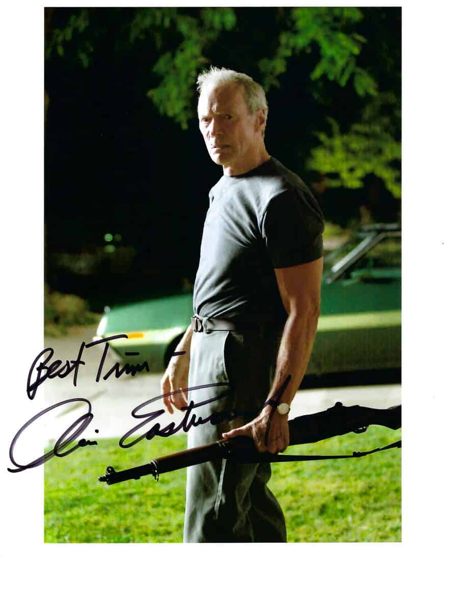 A secretarial signature on an 8x10 photo signed as "Clint Eastwood".