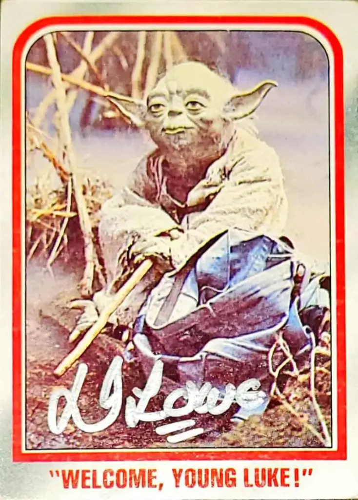 Vintage trading card of Yoda signed by Dennis Lowe TTM