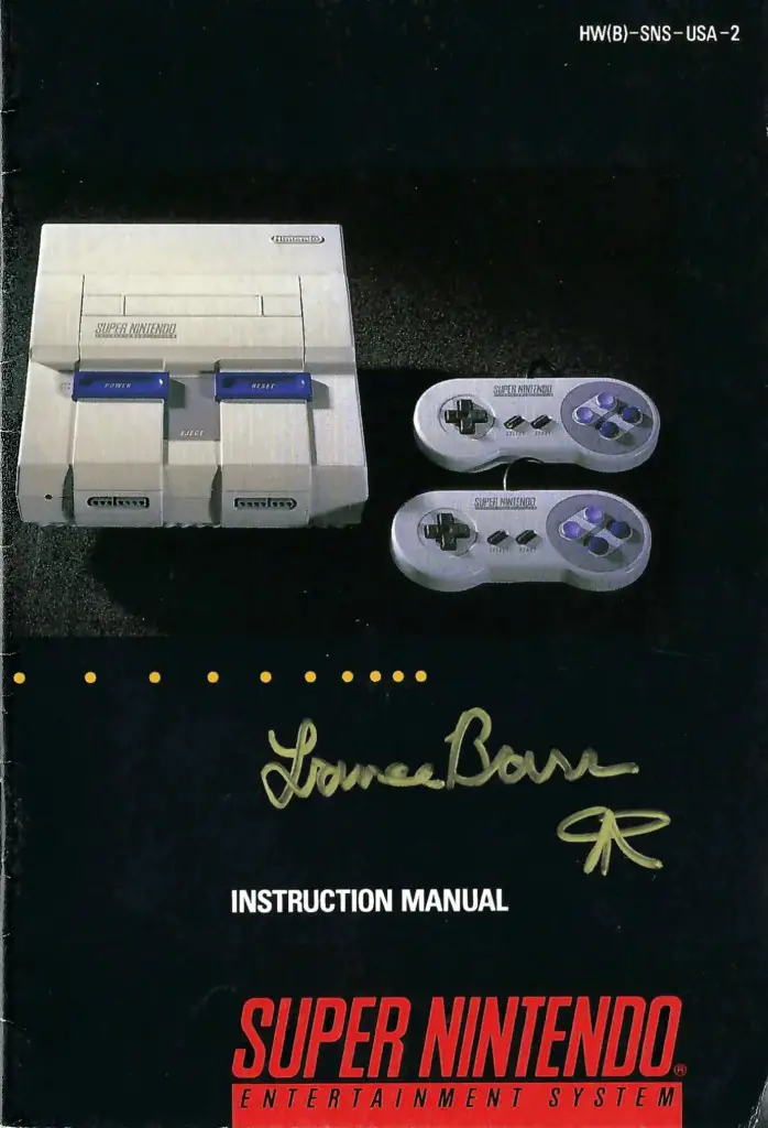 SNES instruction manual signed by the illustrator/designer Lance Barr.