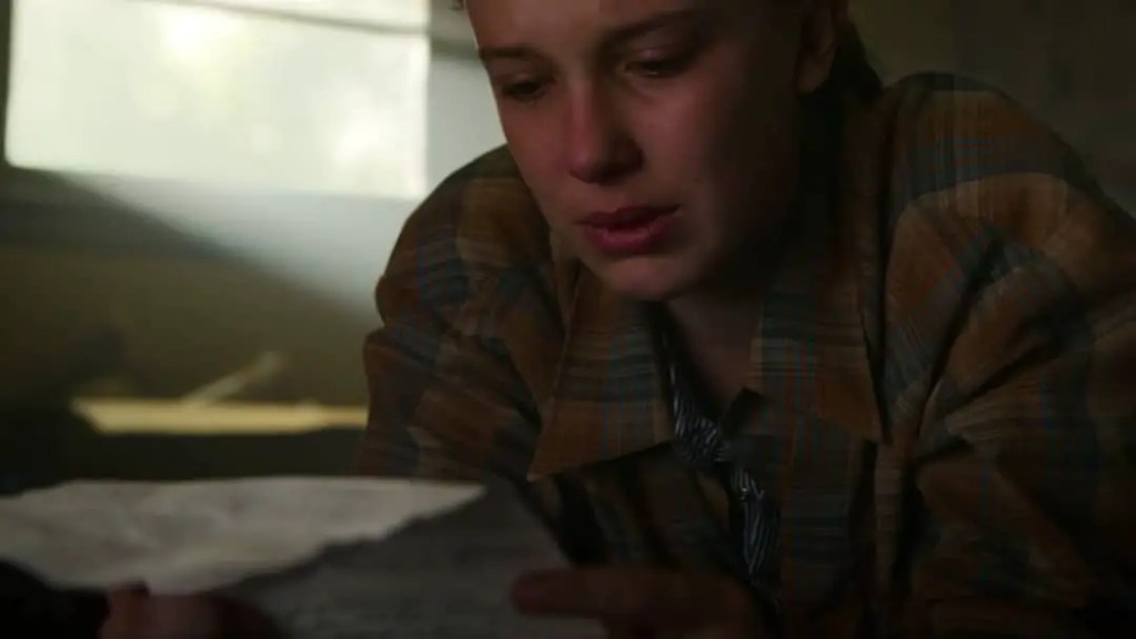 Eleven reading mail. Stranger Things