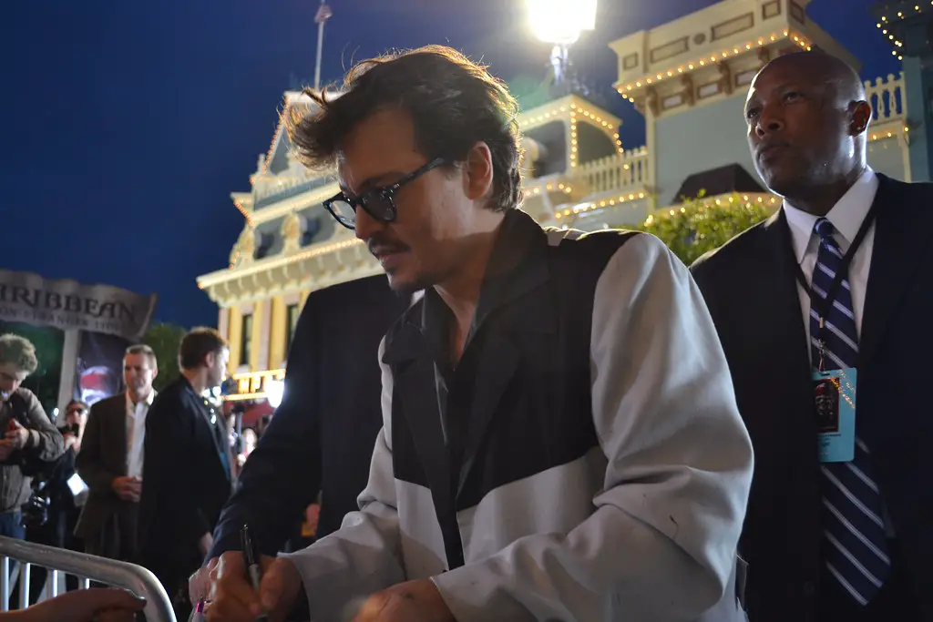 Johnny Depp signing autographs