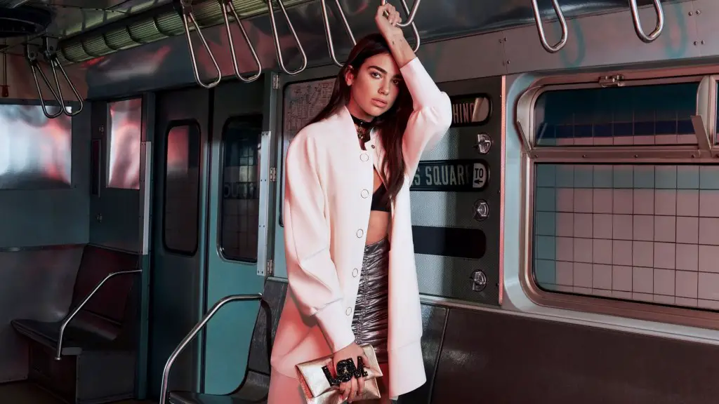 Dua Lipa on a train