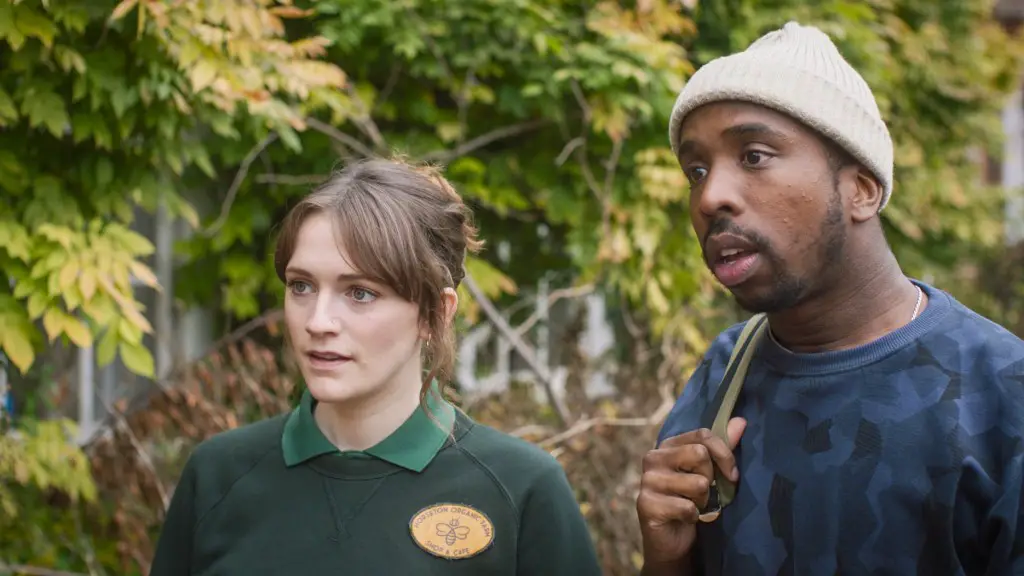 Still of Charlotte Ritchie and Kiell Smith-Bynoe in Ghosts and Getting Out