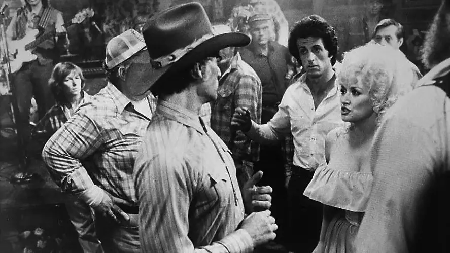 Still of Dolly Parton, Sylvester Stallone and Tim Thomerson in Rhinestone