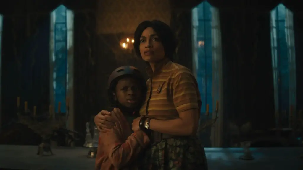 Still of Rosario Dawson and Chase Dillon in Haunted Mansion