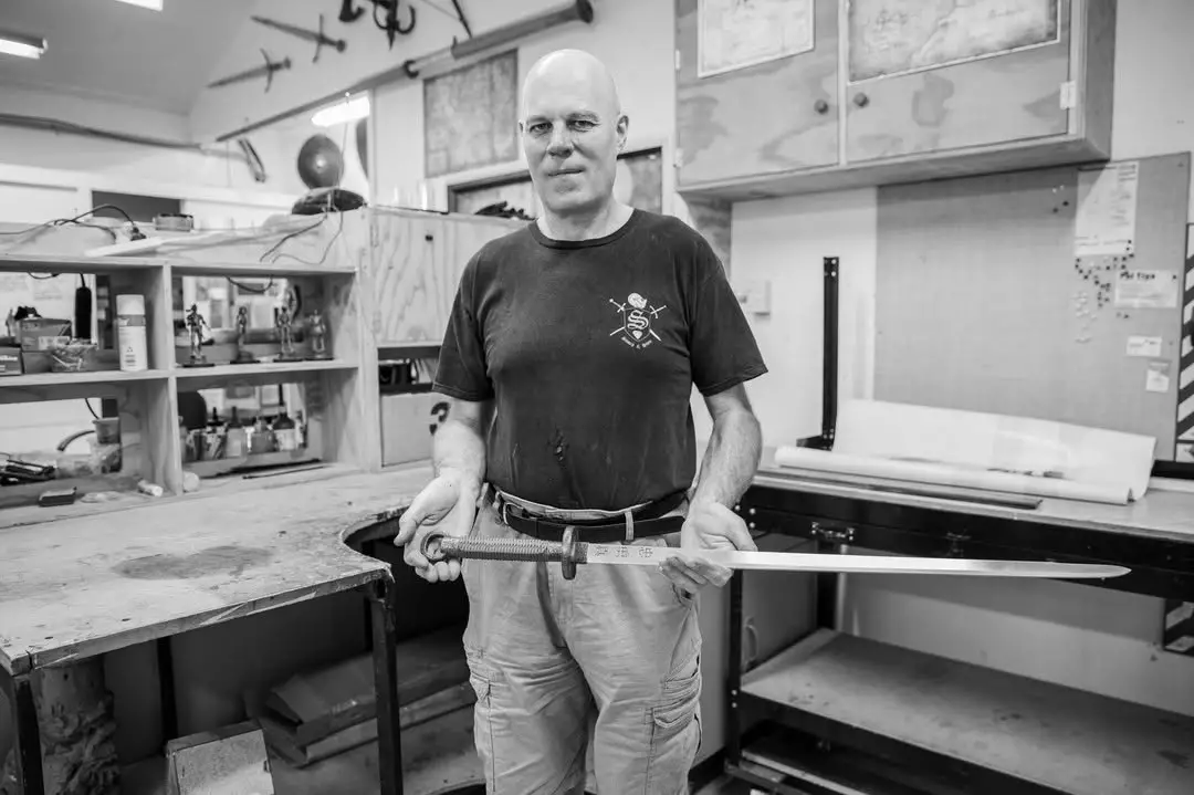 Peter Lyon crafting a sword in the Wētā Workshop