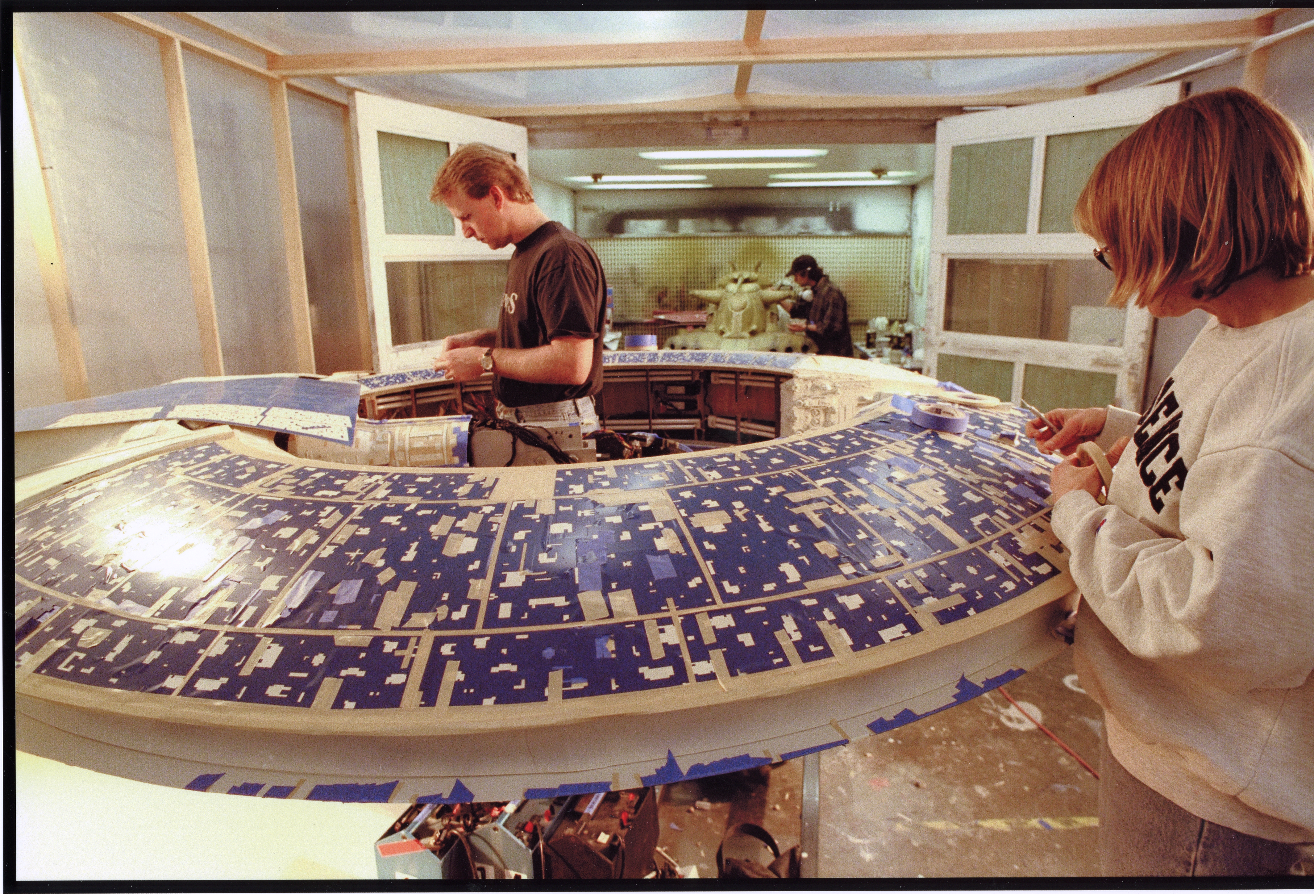 Federation Battleship model with Kim Smith and John Goodson