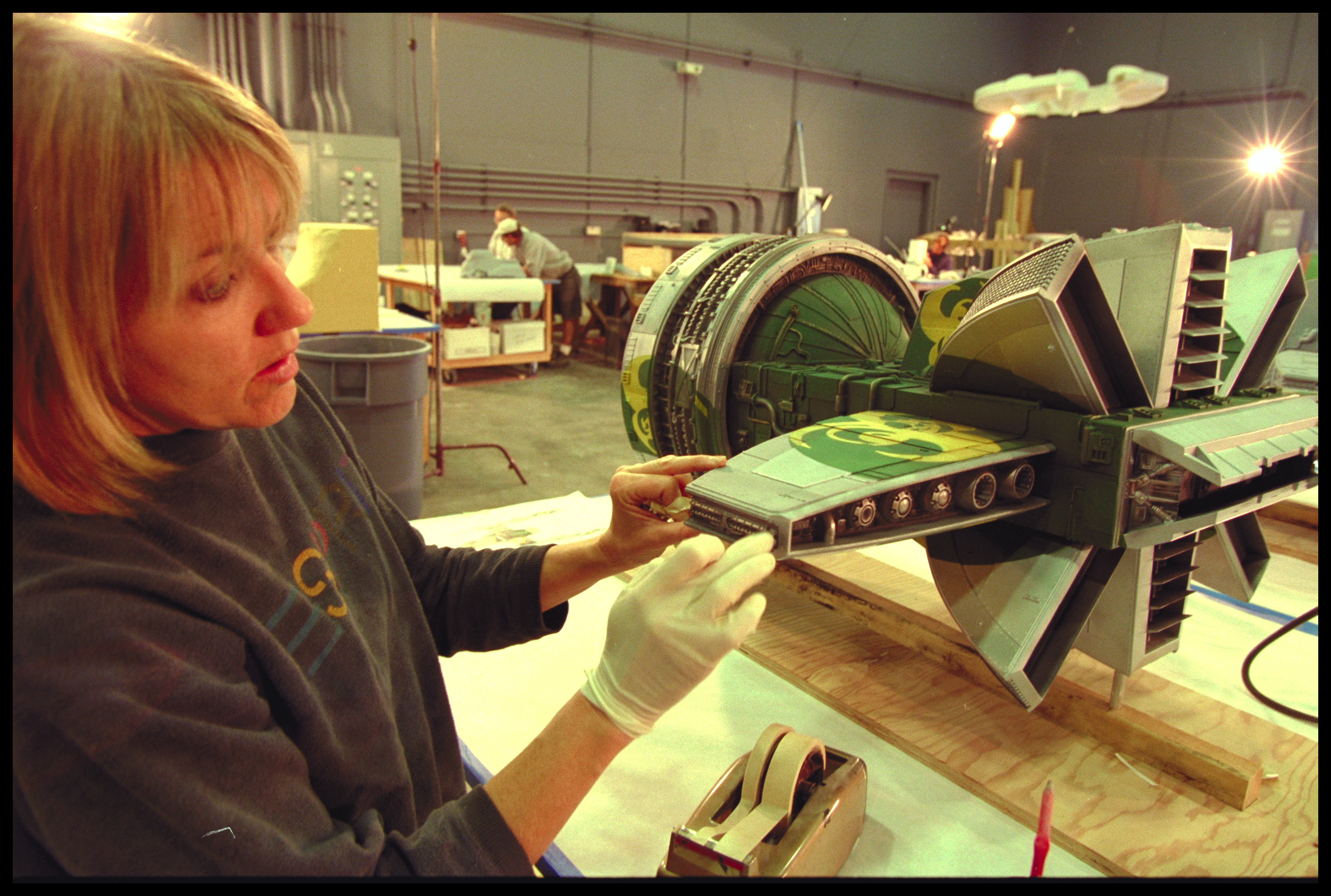 Kim Smith working on a Star Wars model.