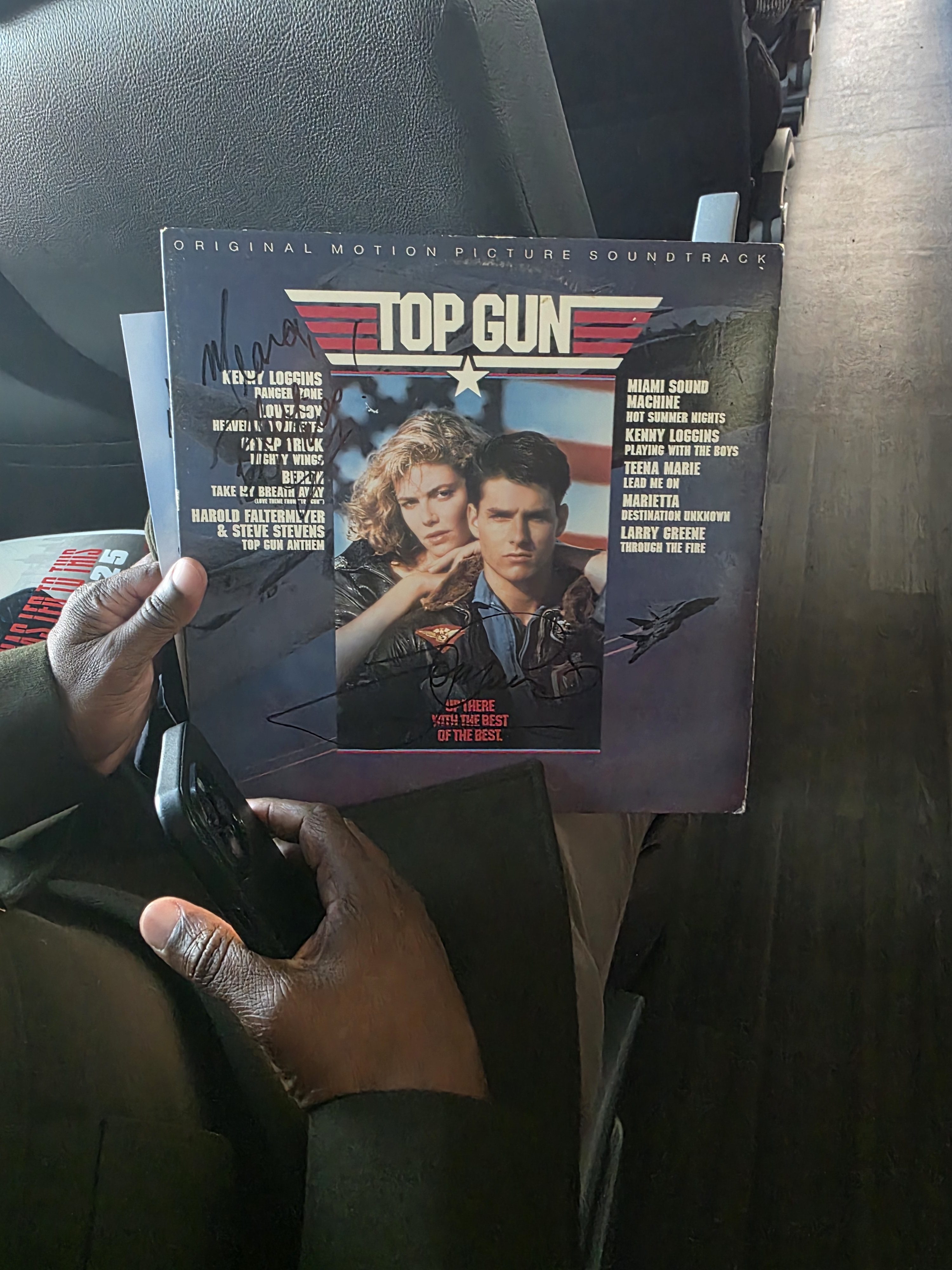 Signed 8x10 photo of Tom Cruise in pilot gear